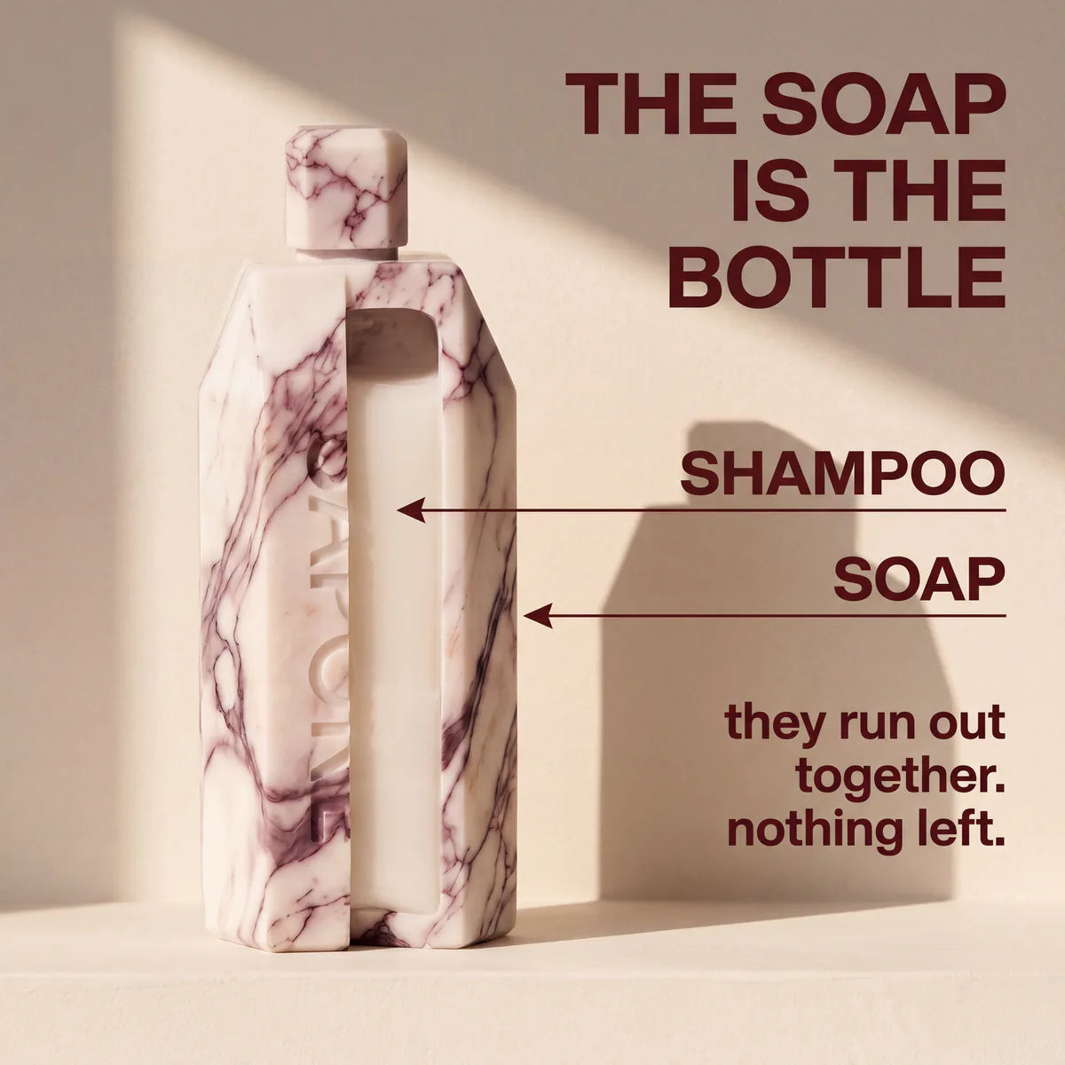 A Sapone bottle cut open to show liquid shampoo sealed inside a solid marble-patterned soap shell, which run out together so nothing is left over.